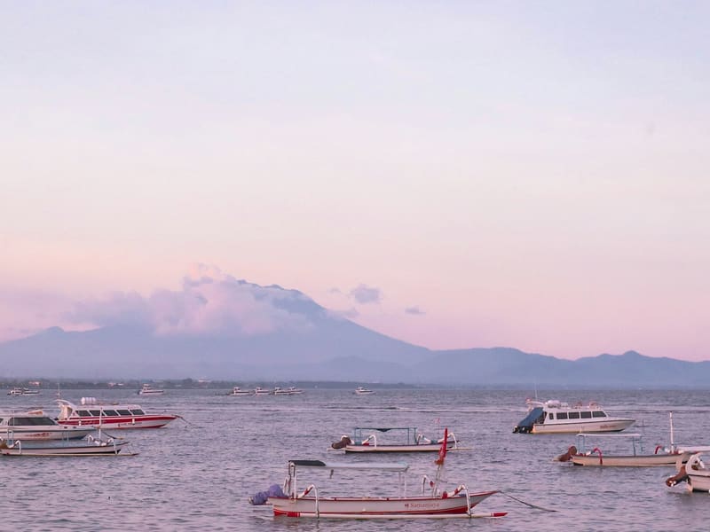 Boats off Sanur, with Mount Agung in the distance