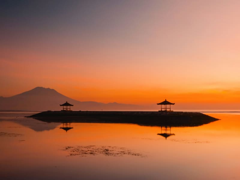 Sunrise over Sanur bay and Mount Agung